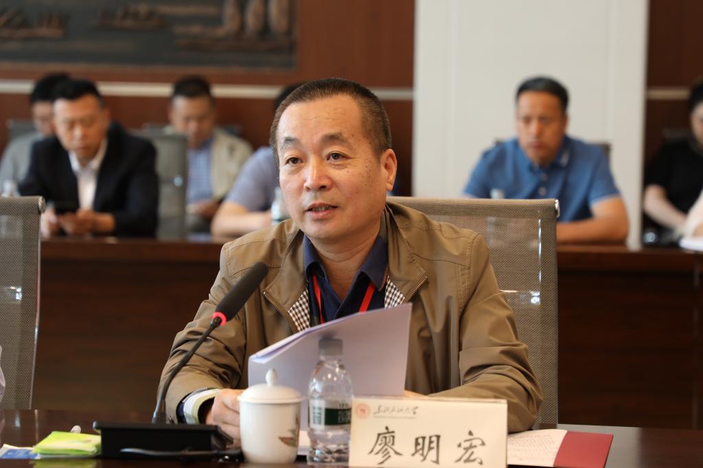 廖明宏代表专家组做反馈发言.